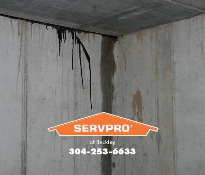 Water is shown seeping into a basement from and outside water source.
